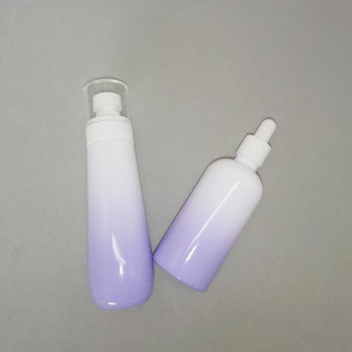 Botellas de bomba de vidrio violeta