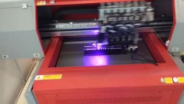 New design small UV bottle printer with Toshiba CE4M printhead