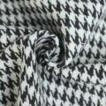 Rilaborato che controlla il tessuto tweed con miscela di lana in lana