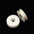 Ceramic guide wheel for chemical fiber textile machines