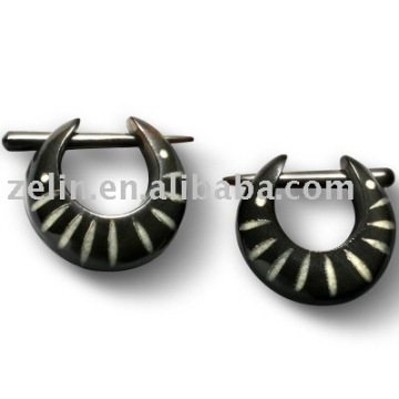 ox horn ear piercing