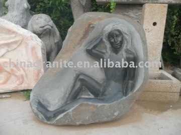 natural stone fountain carved with woman