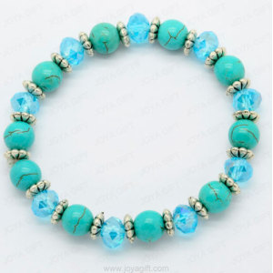 Pulsera turquesa con cristal azul.