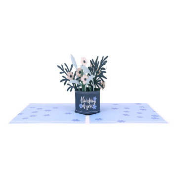 Biglietto d'auguri pop-up con cesto di fiori blu 3D