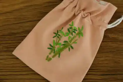 Traditional Chinese Orchid and Bamboo Coin Bag: Aesthetic and Functional Accessories