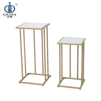High-Low Gold Nesting Display Tables for Mall Clothing Store Island Layout