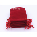 Red velvet jewelry pouch with red string