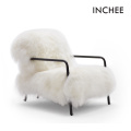 China White Natural Lamb Wool Cosy Armchairs With Armrest Supplier