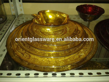 gold color glass plate set with apple bowl