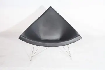 coconut leather lounge chair in black aniline leather