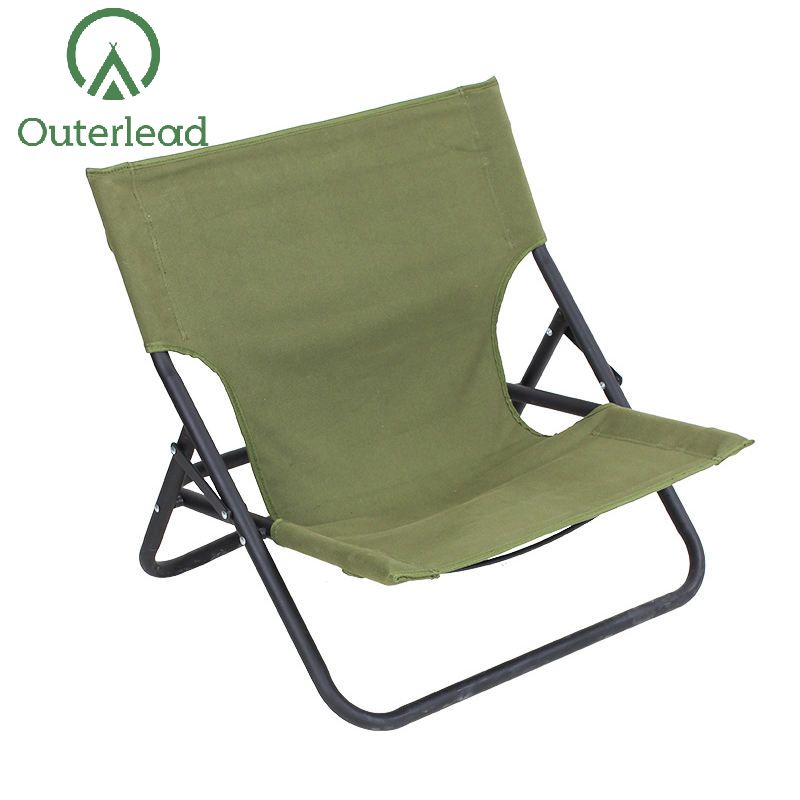 Ytterlead utomhusfällning med låg grön strandstol