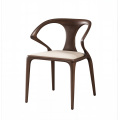 Silla de comedor moderna con respaldo curvo y reposabrazos