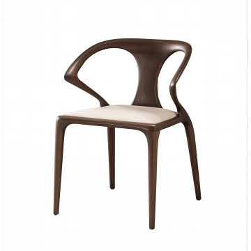 Silla de comedor moderna con respaldo curvo y reposabrazos