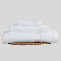 Set di asciugamani di cotone a stella con bordo dobby