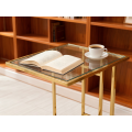 Elegante mesa lateral de acero inoxidable chapado en oro