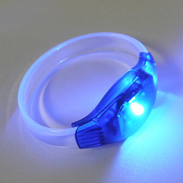 Fake designer charm silicone bracelet, voice activated