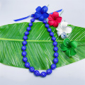 Couleur bleu brillant kukui graduation lei avec chuuk