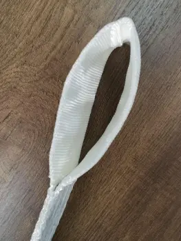 Lifing sling with one reinforced eye