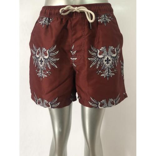 Mens Beach Pants Reddish brown retro totem men's beach shorts Manufactory