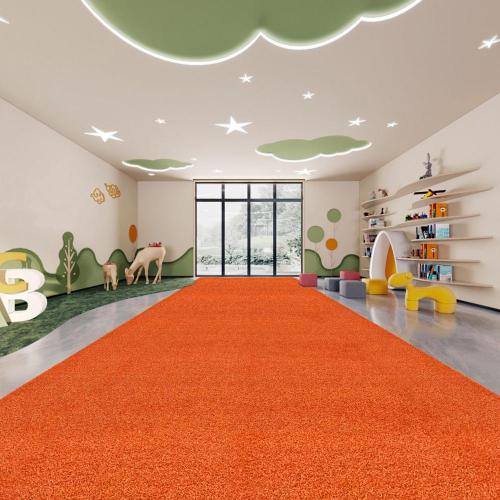 Rumput rumput sintetis oranye