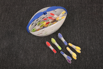 Plactic clothes pegs basket