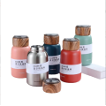 Small capacity portable vacuum flask with wood lid