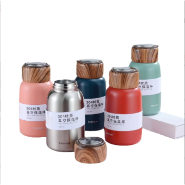 Small capacity portable vacuum flask with wood lid