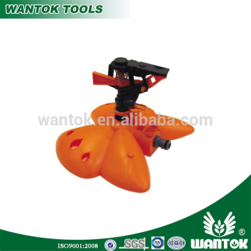 Butterfly base with plastic impulse lawn irrigation sprinkler