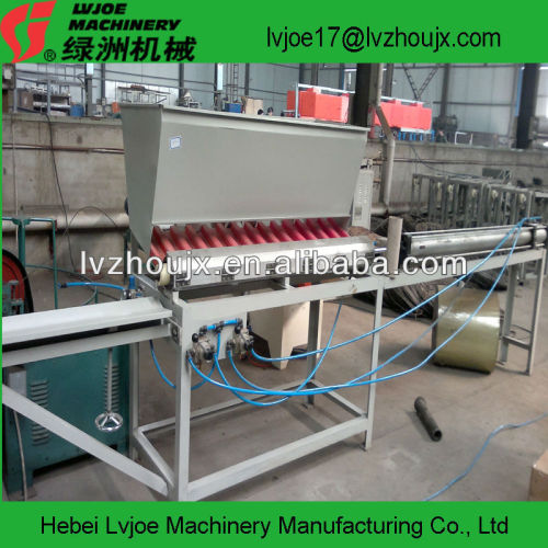 pneumatic machine for loading and unloading paper cores