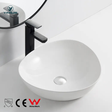 Glossy White Ceramic Bathroom Sink with Modern Triangle Design