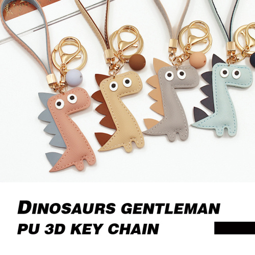 Retractable Key Chain Creative dinosaur keychain PU leather bag pendant personalized bell car keychain pendant gift Supplier