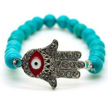 Bracelet de pierres précieuses étirées turquoise avec perles rondes de 8 mm avec pièce pour le mauvais œil Diamante