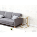 Elegante mesa lateral de acero inoxidable chapado en oro