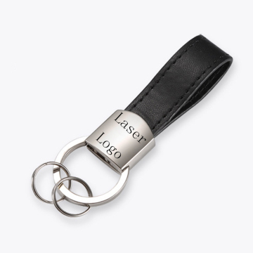 Chaîne de clés de la voiture à anneau de traction à ressort en métal avec cuir authentique PU