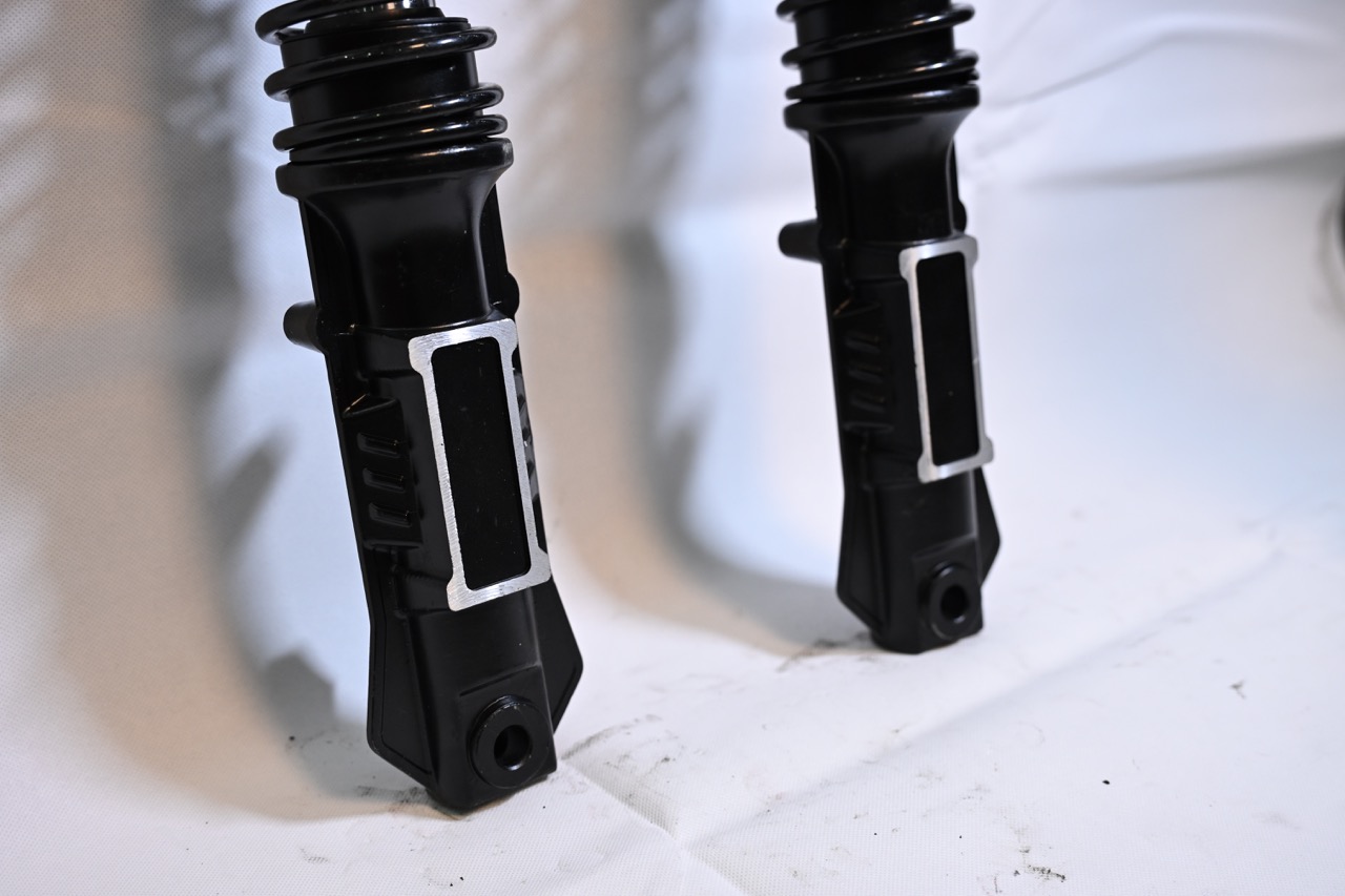 Complete view of Ming Diamond outer spring shock absorber showing coil spring and hydraulic damping unit