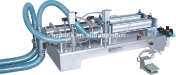 Double nozzles liquid filling machine