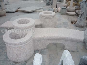 garden stone bench with flowerpot