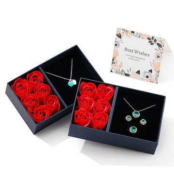 Boîte-cadeau de bijoux de fleurs conservées en rose avec emballage en plastique