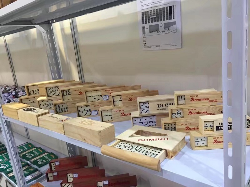 plastic dominos in wooden box