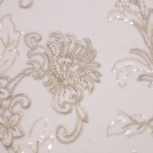 Dentelle de paillettes d&#39;abricot pour la mariée