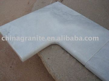 white marble pool tile