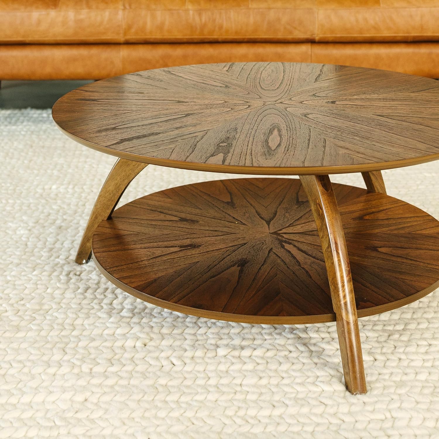 Sleek round coffee table walnut wood grain