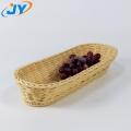 oval shaped brown rattan basket for fruit display