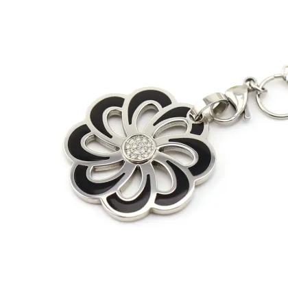 Flower pendant with black glue and crystal