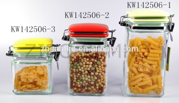 Popular daily glass storage jar with ceramic lid and iron clip