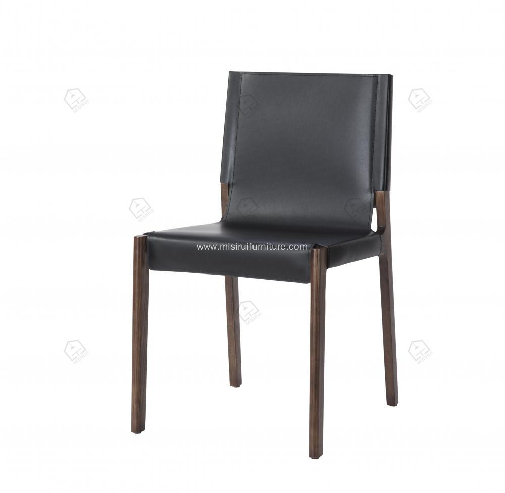 Black saddle leather armless wooden feet dining chairs