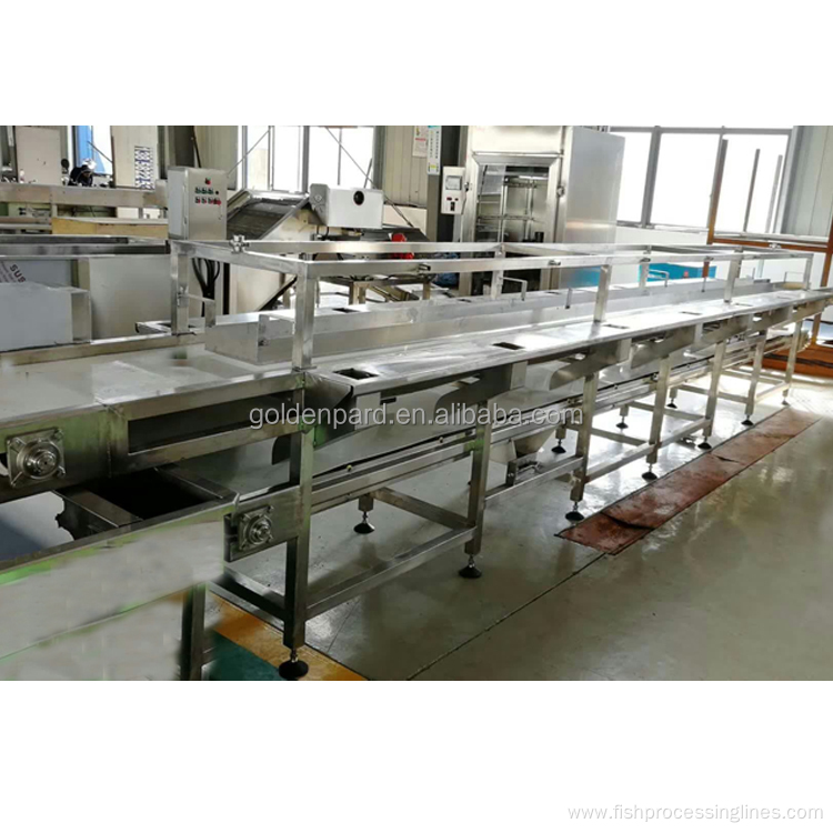 fish gutting machine in fish processing line