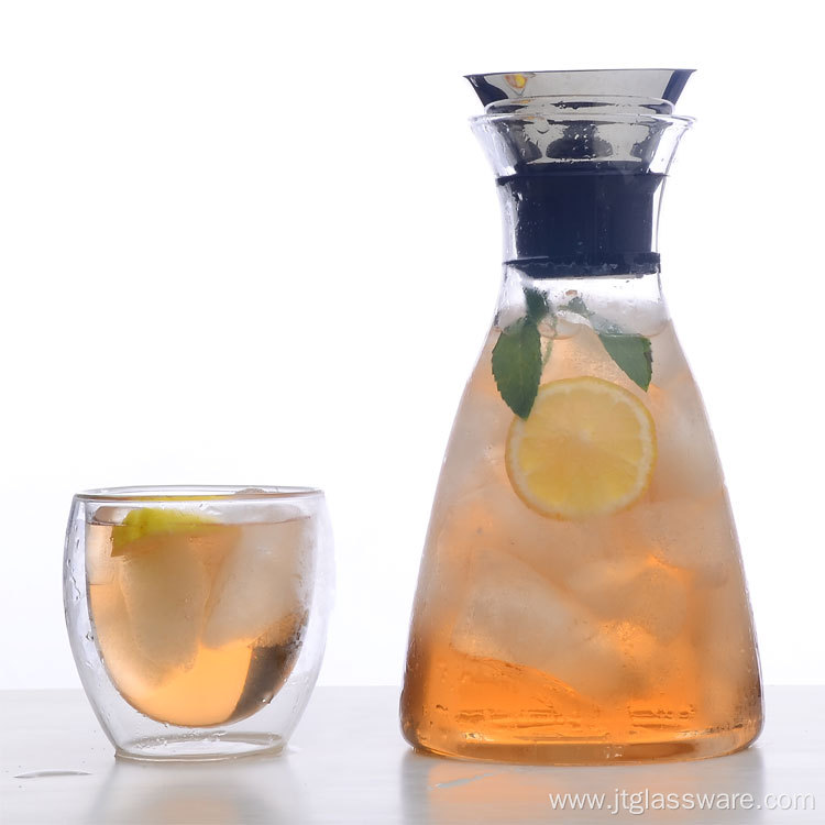Stemless glass beverage picther with steel lid