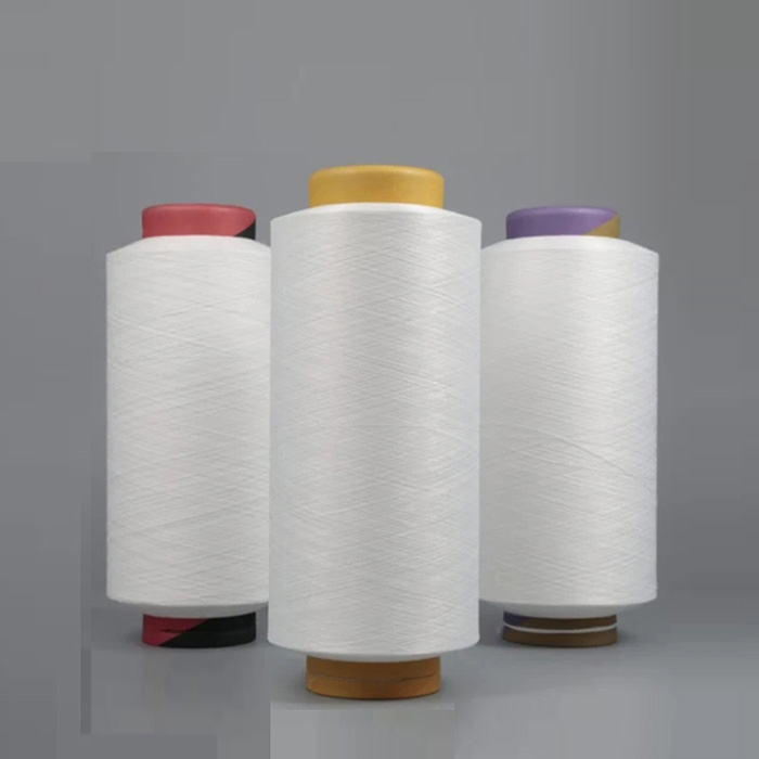 High strength and low shrinkage polyester filament