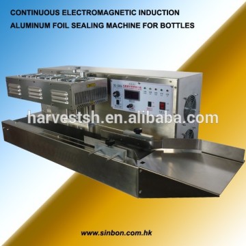 Electromagnetic induction aluminum foil sealing machine